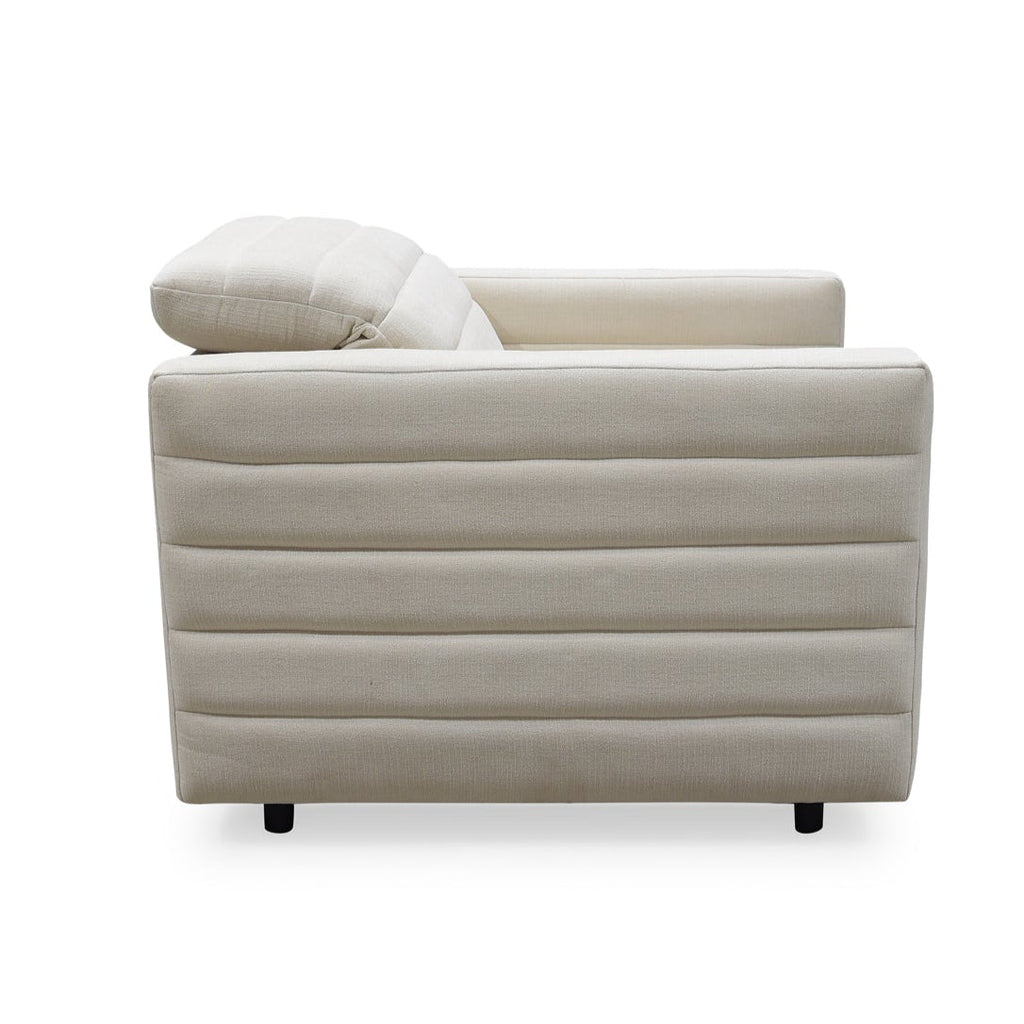 Fauteuil inclinable contemporain en cuir avec détails matelassés et commandes dissimulées pour le salon