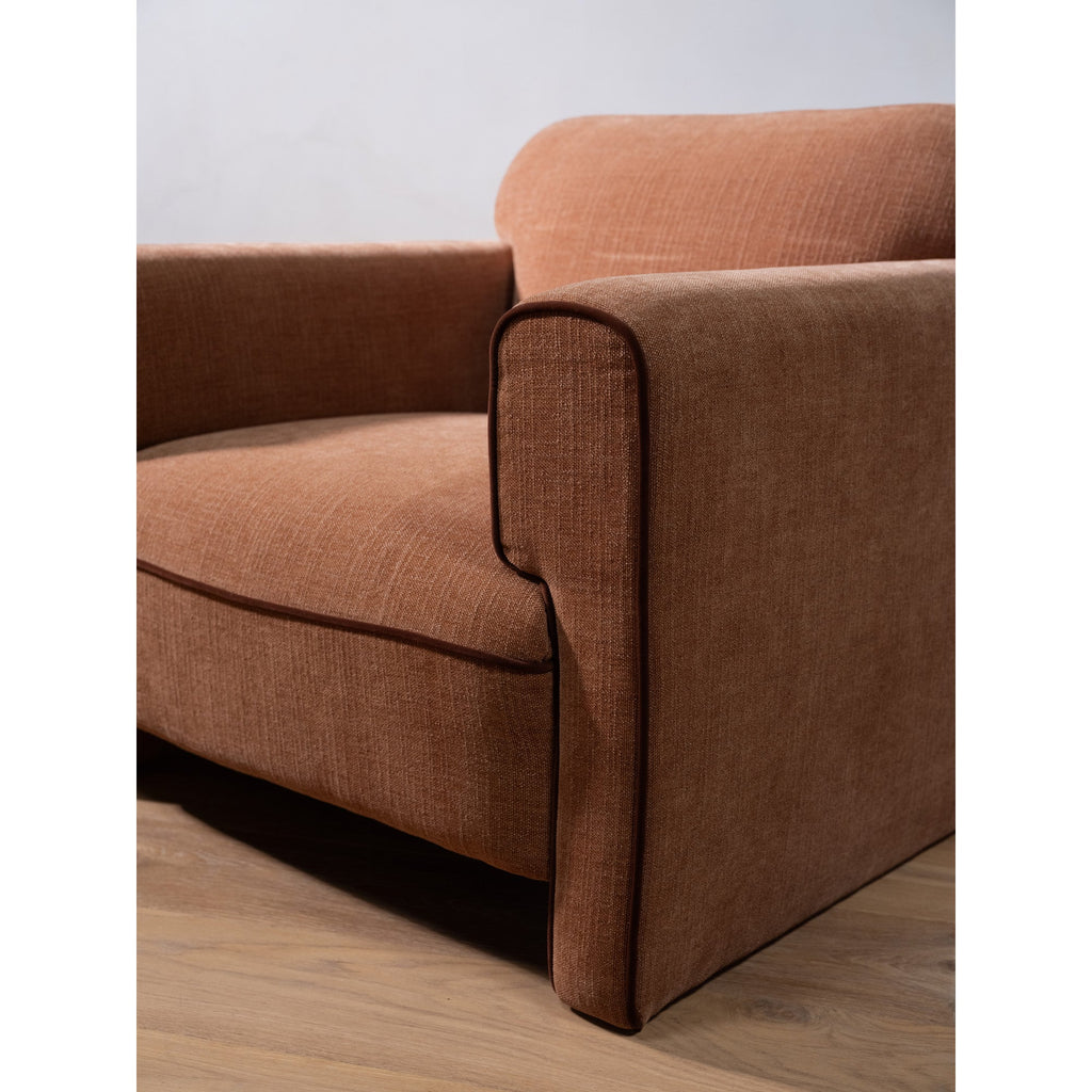 Fauteuil en polyester moderne roulé, avec passepoil contrastant et pieds tapissés pour le salon