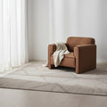 Fauteuil en polyester moderne roulé, avec passepoil contrastant et pieds tapissés pour le salon